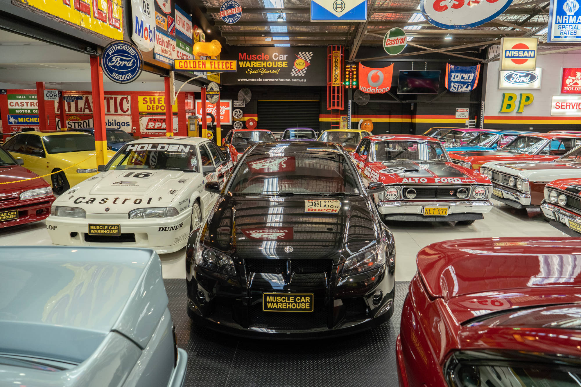 Muscle Car Warehouse Interior Banner