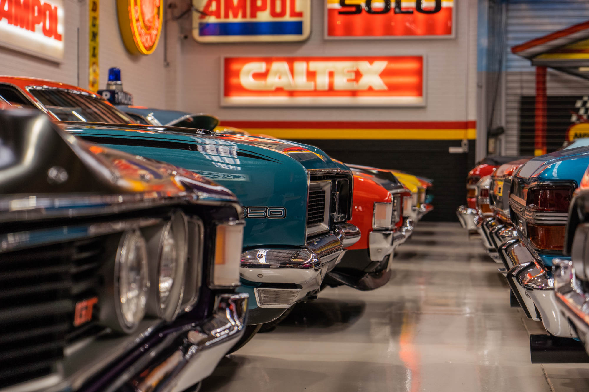 Muscle Car Warehouse Interior Banner
